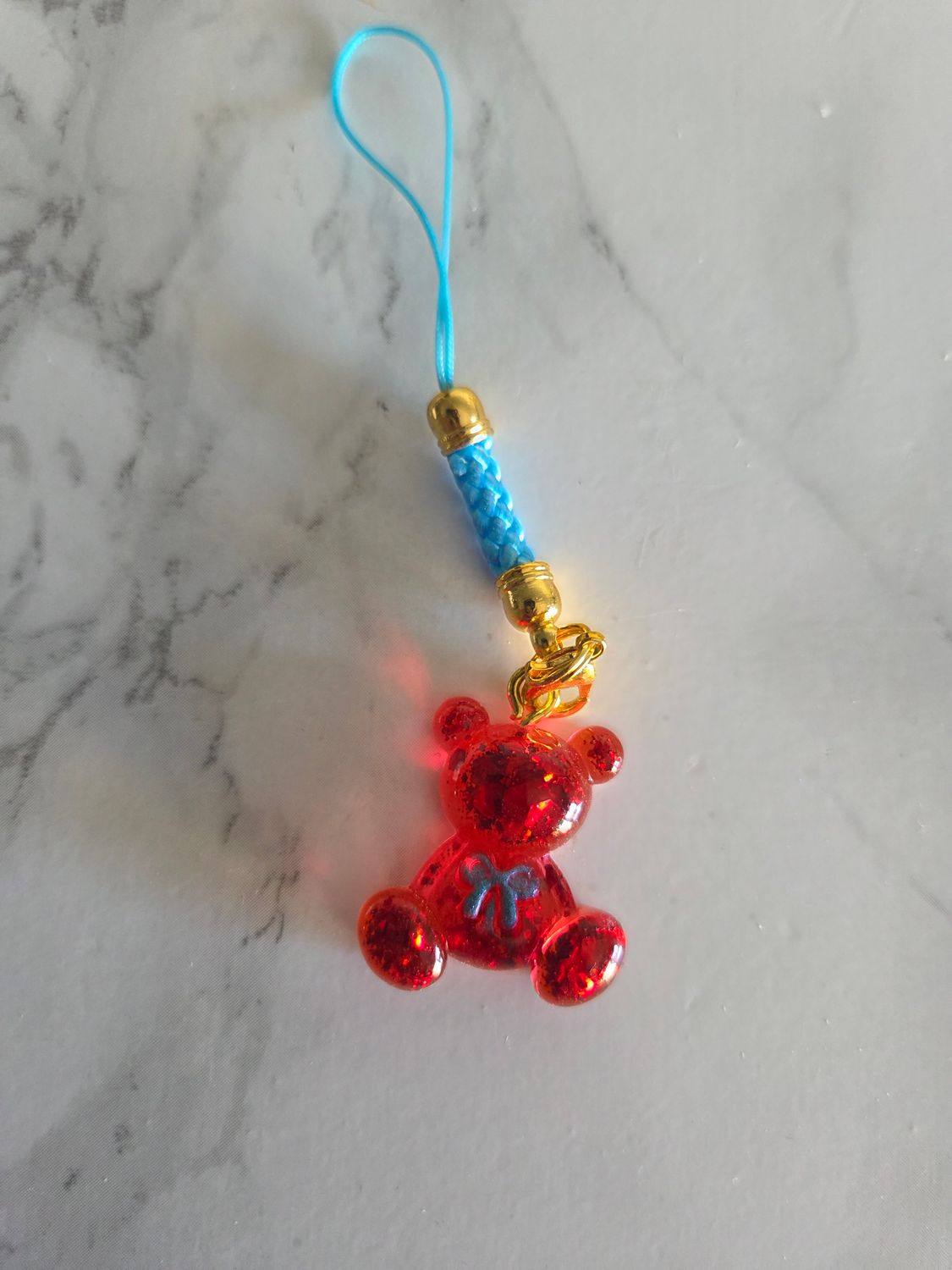 Bijou mini ourson noeud rouge pailleté