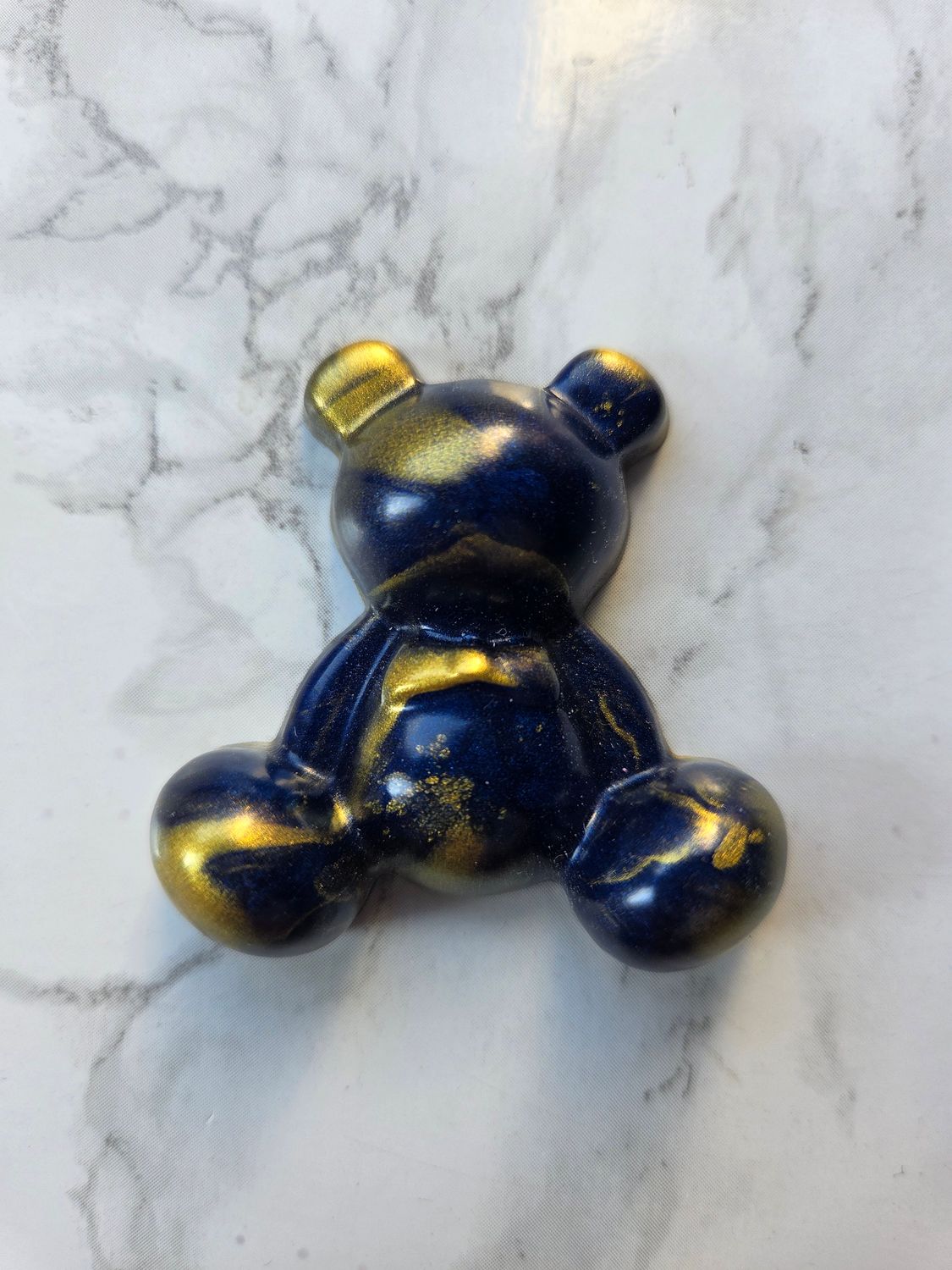 Ourson assis bleu nuit et or