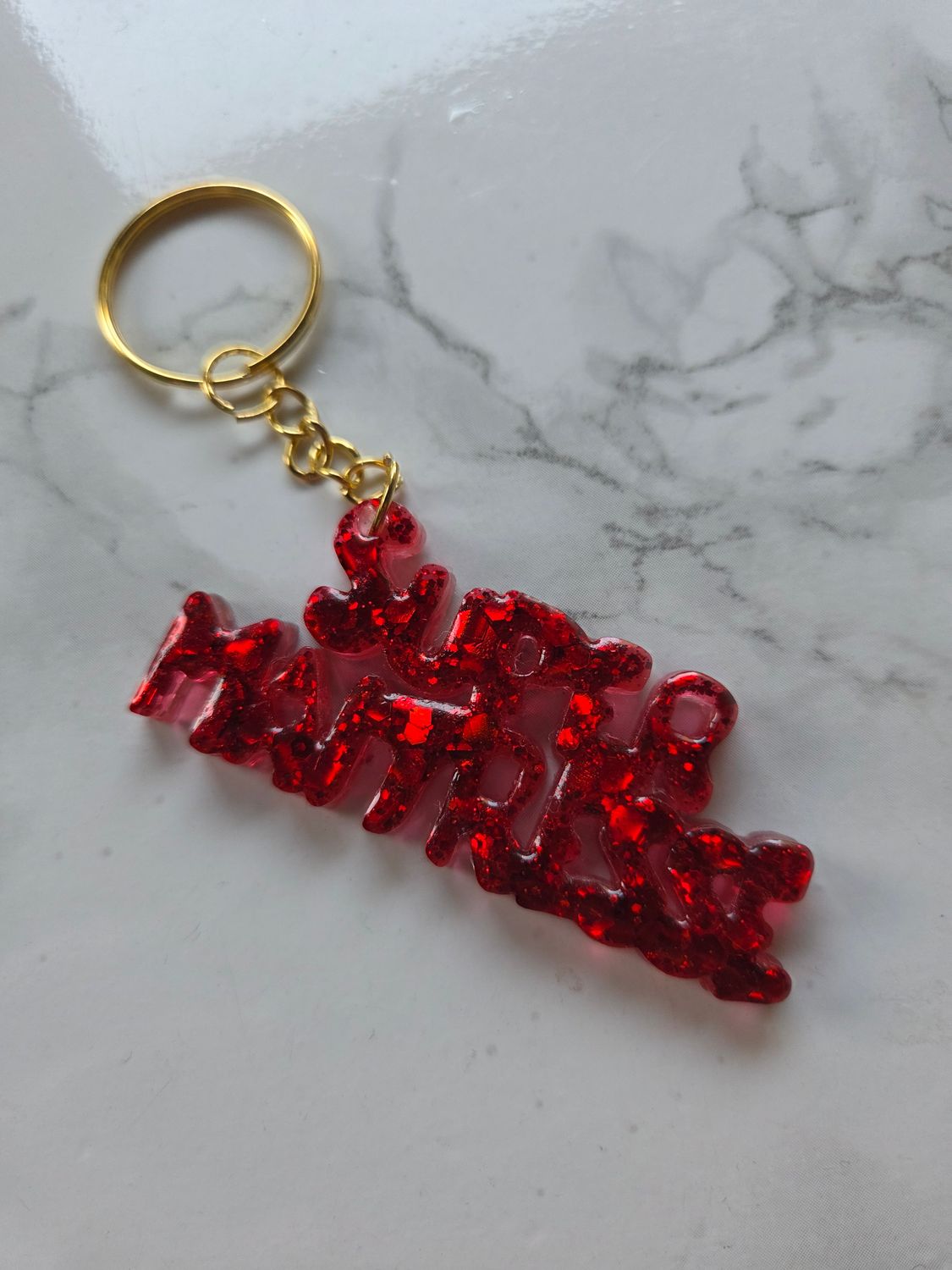 Porte clé super maîtresse rouge pailleté