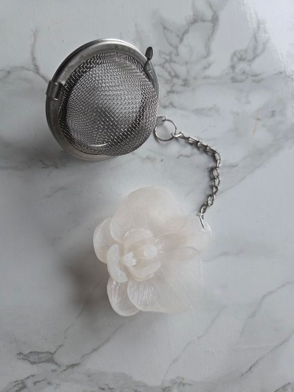 Boule à thé orchidée blanche nacrée