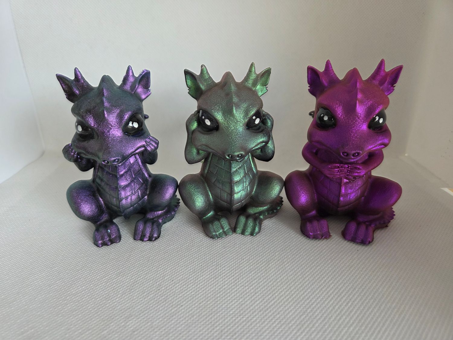 Trio de dragons caméléon