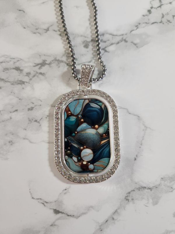 Collier pendentif strass argenté rotatif