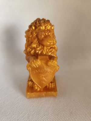 Lion statuette blason doré