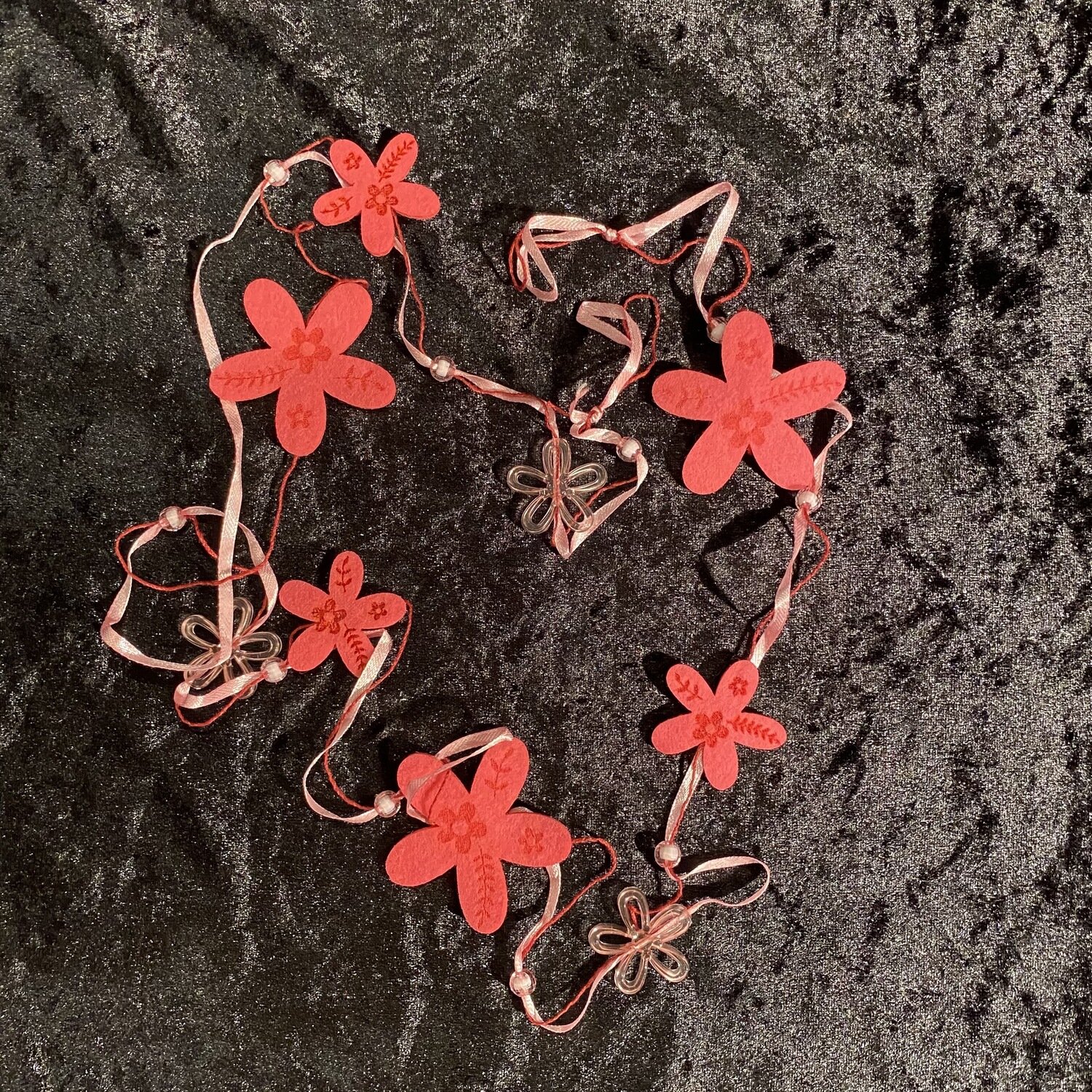 Guirlande fleurs feutrines fuchsia