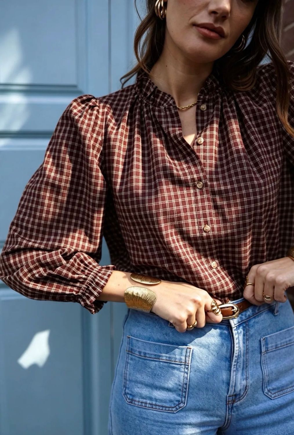 Blouse met ruitjes, elegante pofmouwen en subtiele plooidetails.