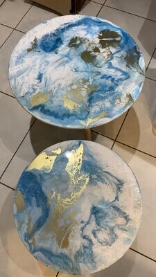 Small glass table resined of handcrafted resin topped glass round side table with three oak coloured legs blue sky and white clouds