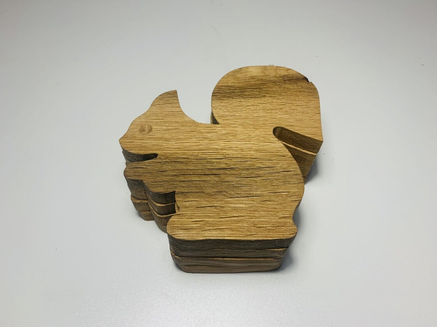 Squirrel shaped oak coasters