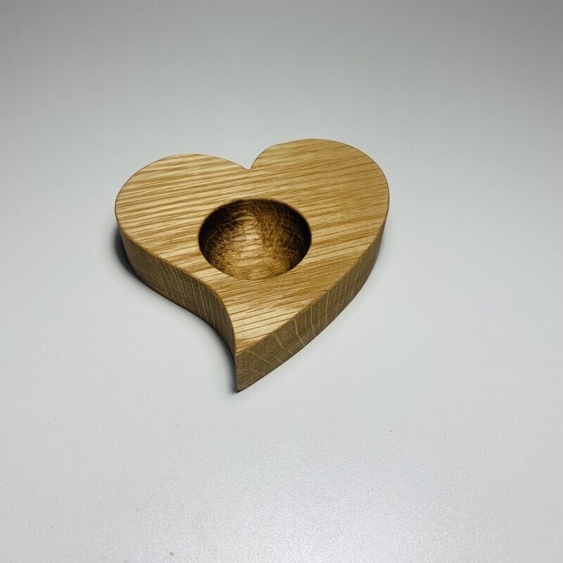 Heart shaped egg cup with left hand curve