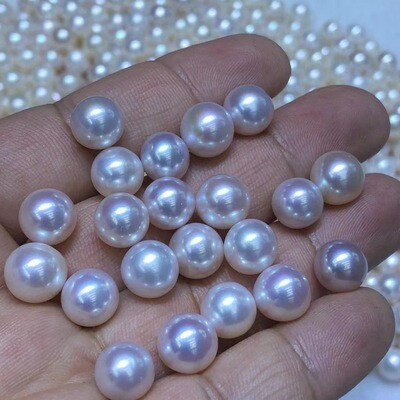 Loose pearl strands and beads