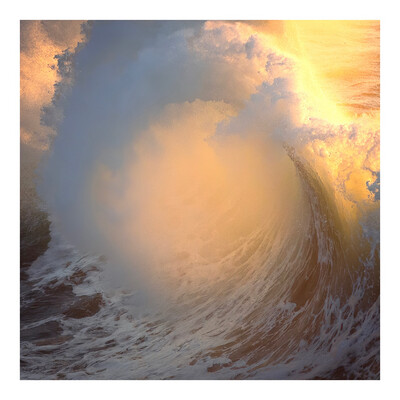 Photo of a large wave backlit by sunset 
