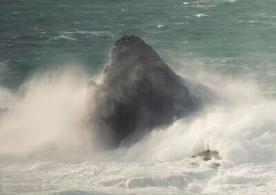 Cornwall's Bull Rock Weathers a Winter Wave's Fury