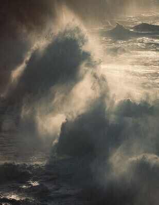 Photo of large waves crashing into each other on the Cornish Coast