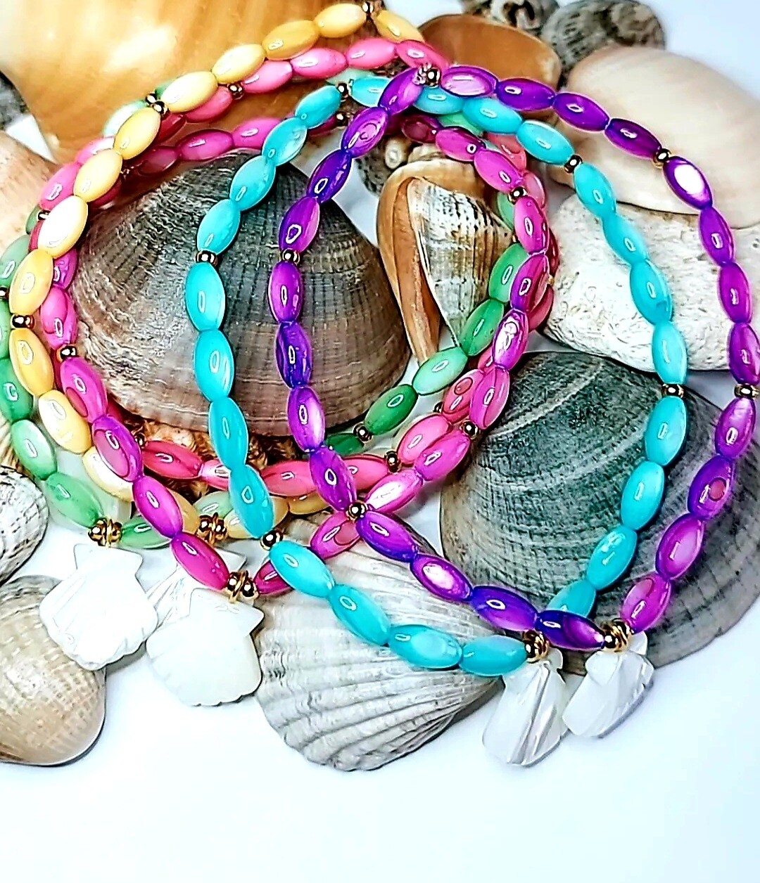 PULSERA IRIS CON CONCHA