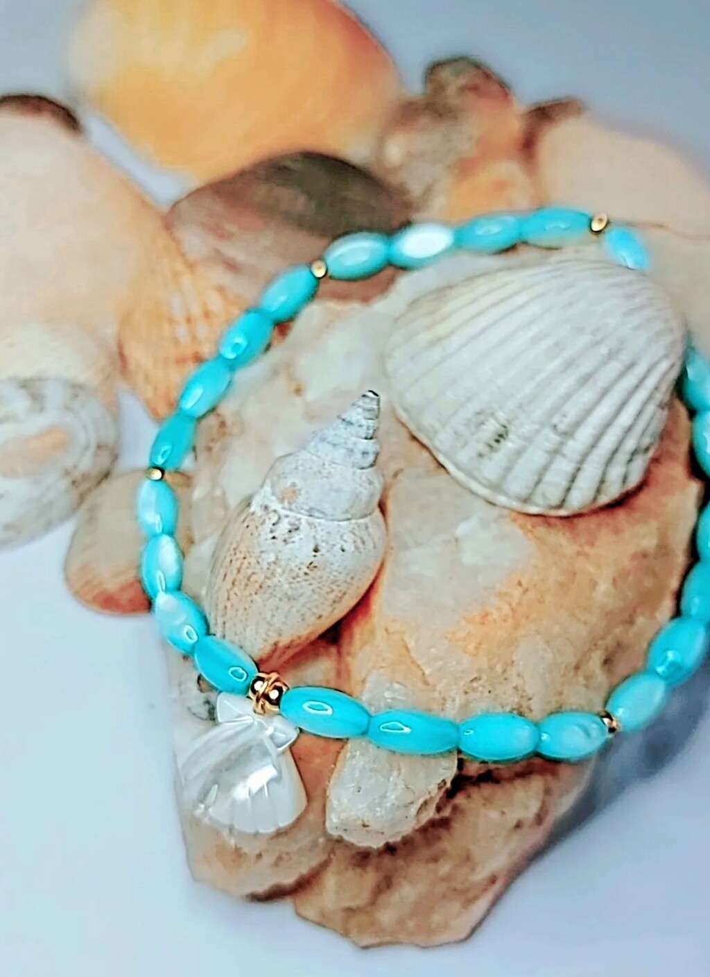 PULSERA IRIS CON CONCHA