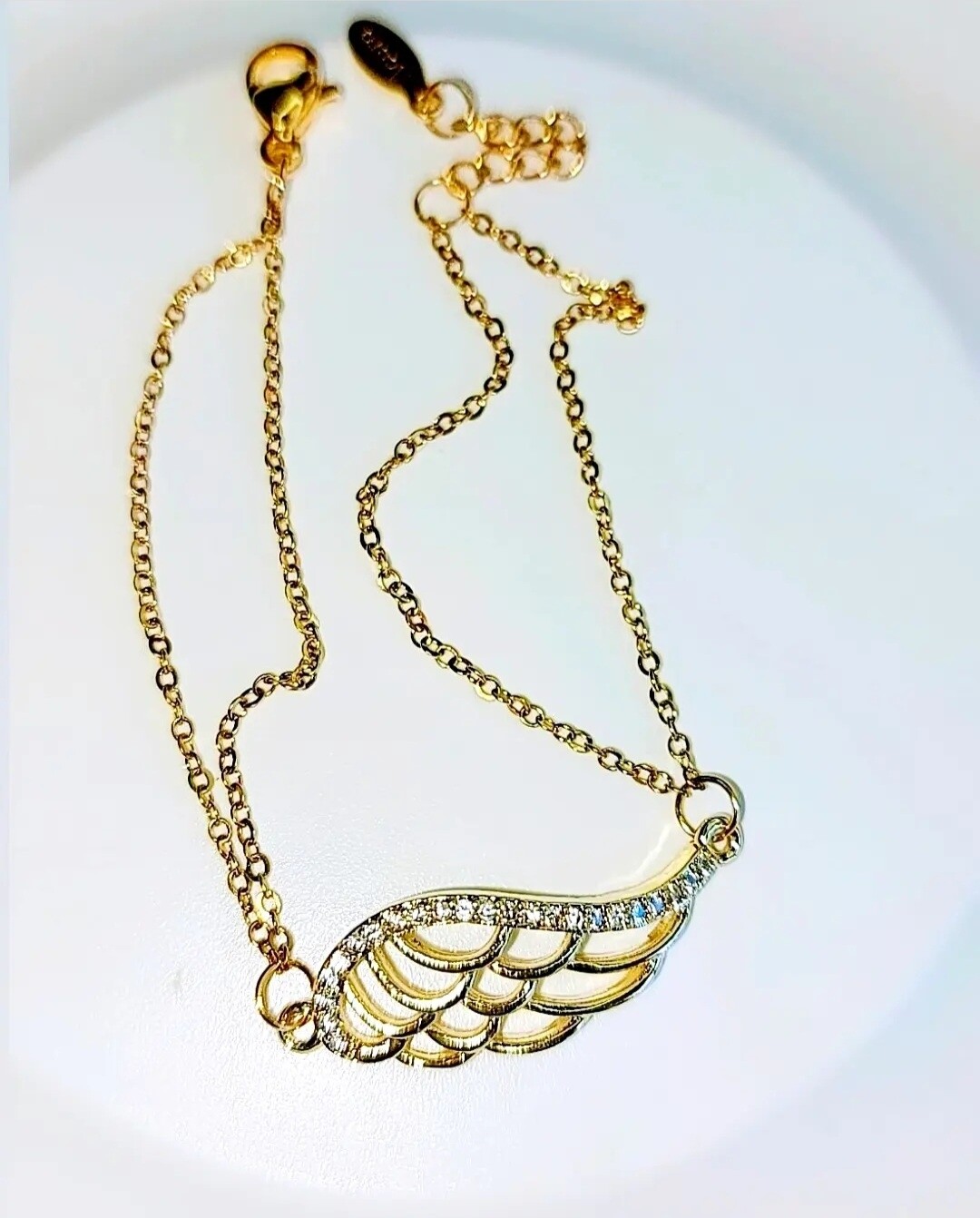 PULSERA PLUMA