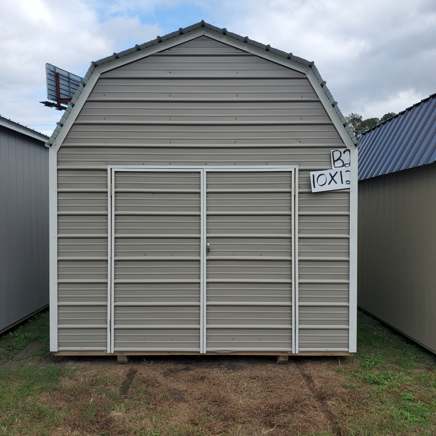 10x12 Lofted Barn - Horizontal Metal Siding - Front Entrance