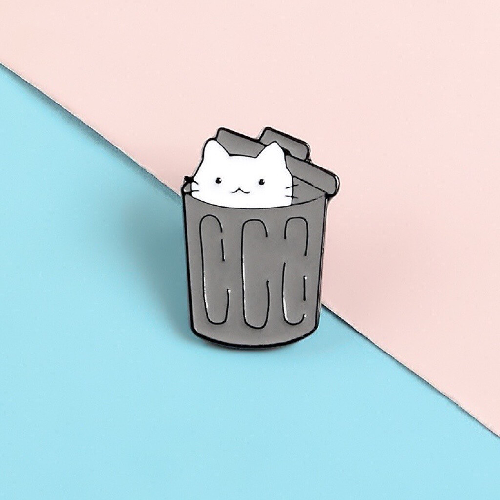 Cat In The Trash