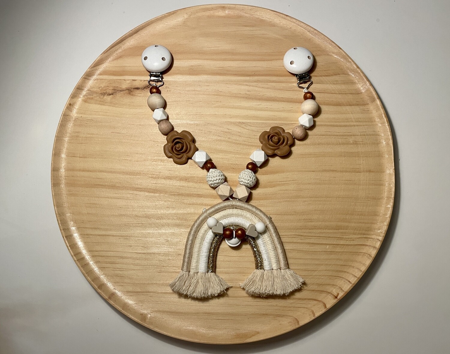 Kinderwagenkette Regenbogen beige/weiss