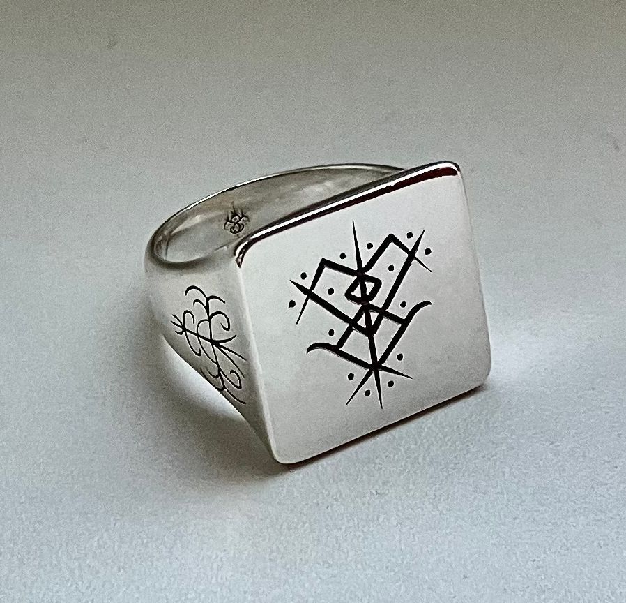 Customised square ring amulet