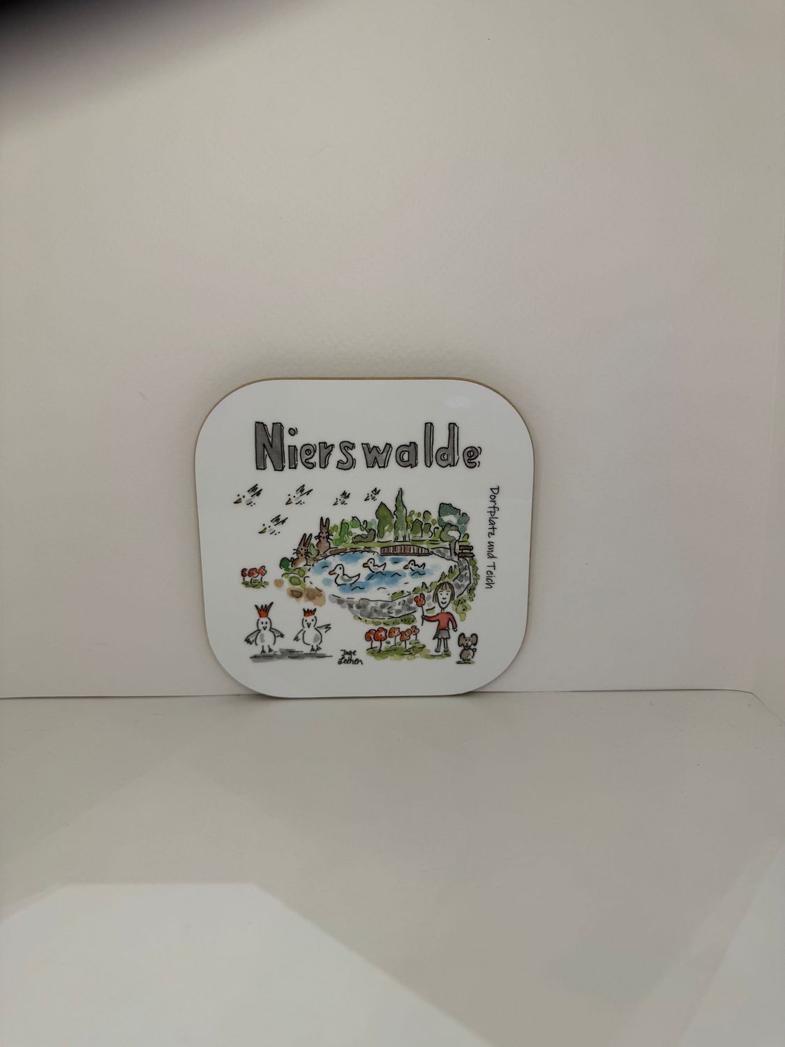 Untersetzer Nierswalde Dorfplatz und Teich