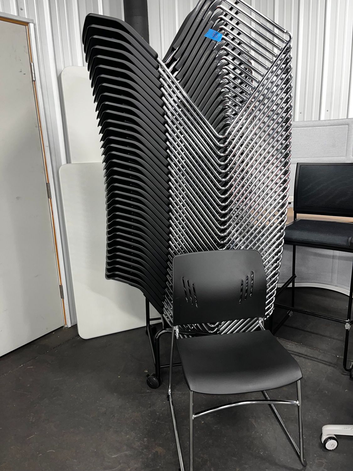 Black Plastic Stack Chairs *Like new *300 In stock