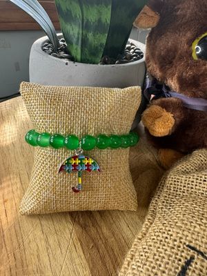 Green Autism Awareness Bracelet with Puzzle Umbrella Charm