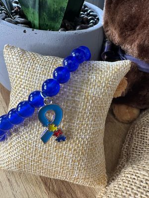 Blue Beaded Autism Bracelet with Puzzle Ribbon Charm