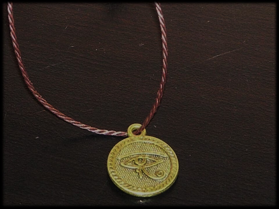 Amuleto, talismán, pantáculo egipcio. Ojo de Horus. Mágia. Ritual