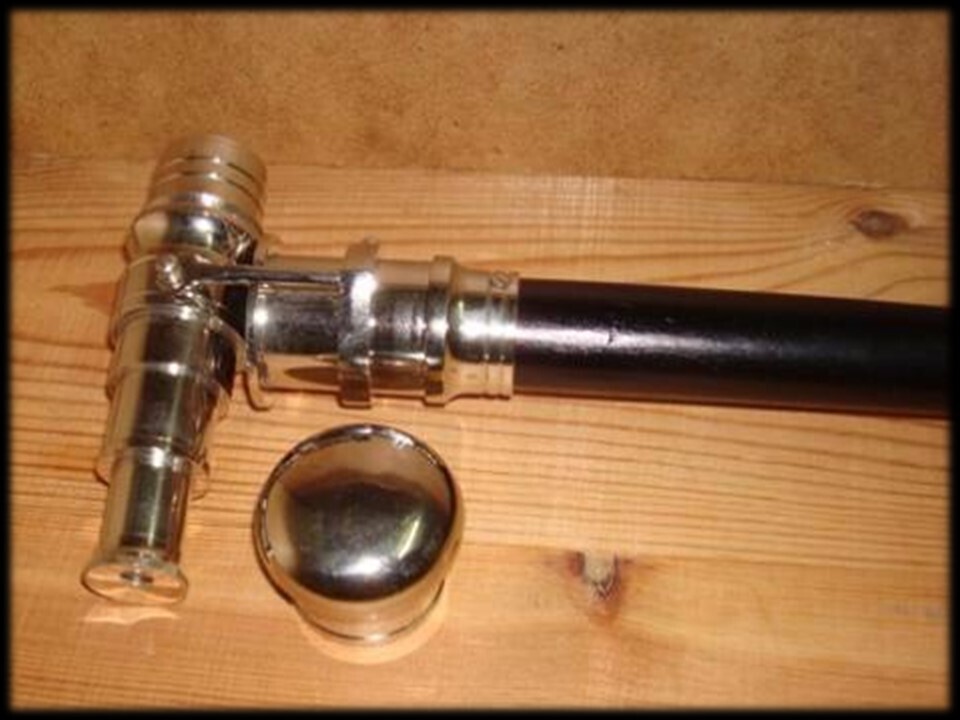 Catalejo oculto en bastón. Gadget espia.