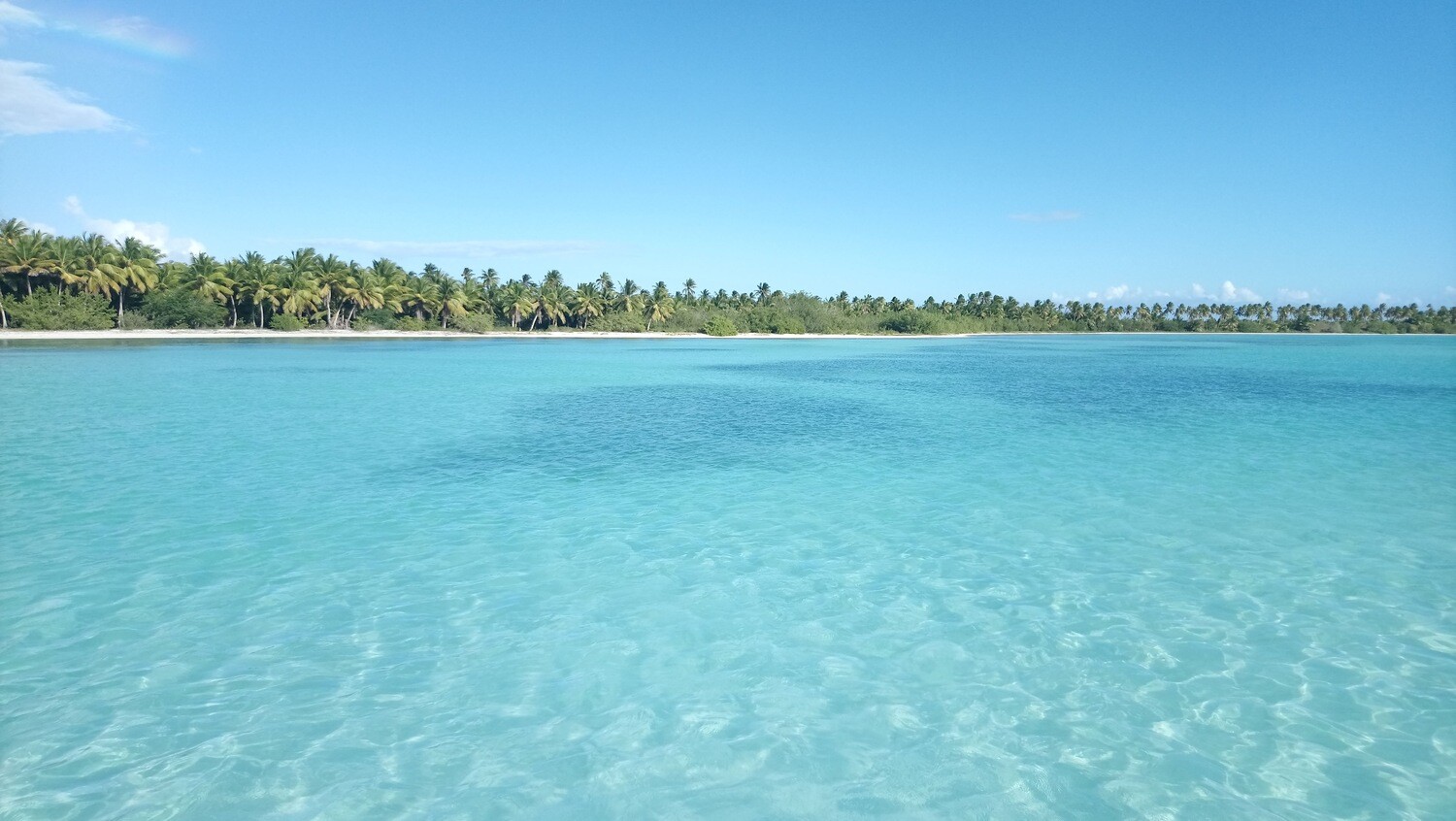Peaceful beach and turquoise sea of Saona Hola
