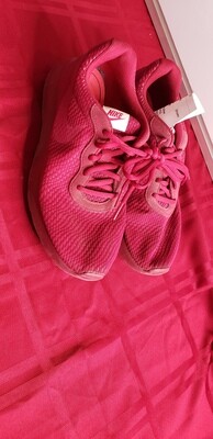 Maroon Nike running shoe