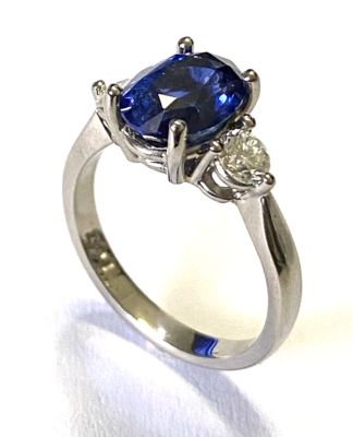 Platinum diamond and blue sapphire ring