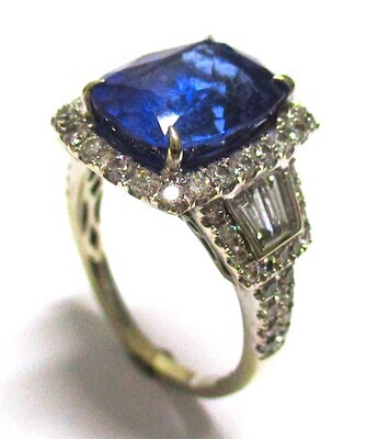 9K white gold diamond and tanz ring. Retail: R171 000.00