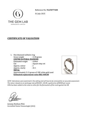 One 18K white gold diamond solitaire ring