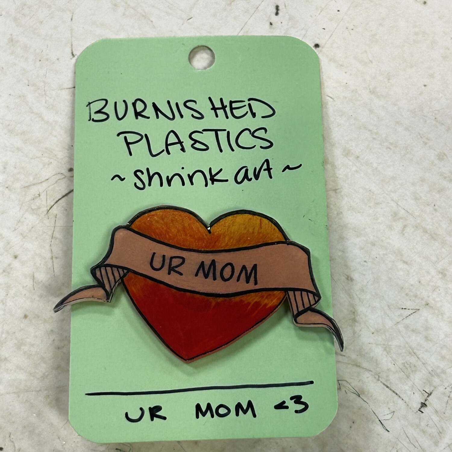 BURNISHED PLASTICS: UR MOM - Shrink Art Pin by Kaiju Cabal