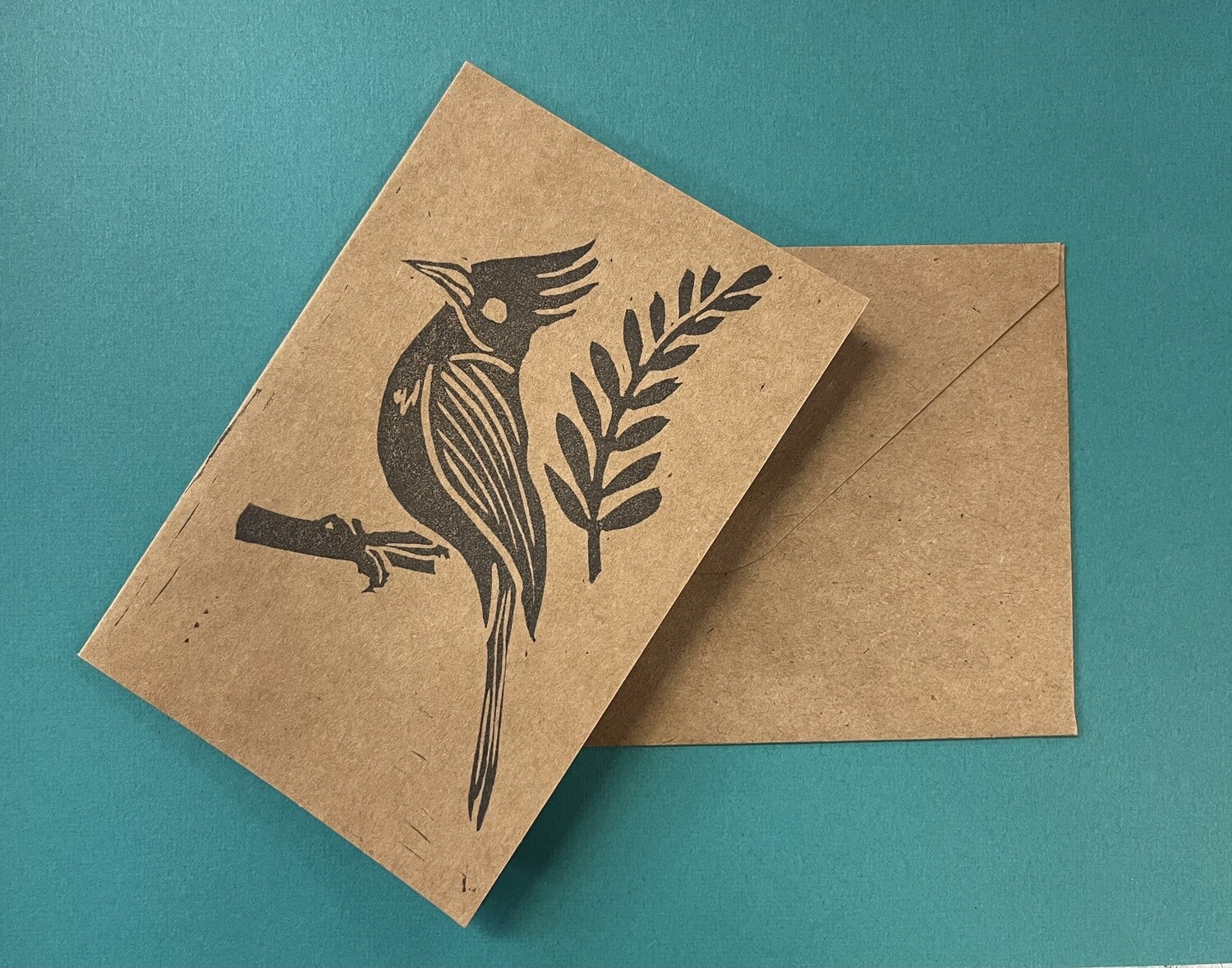 Stellar Jay & Pine - Holly-Daze Greeting Card by Kaiju Cabal