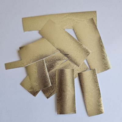 Bundle of Random Sized Pieces of Vinyl - Patterned Gold