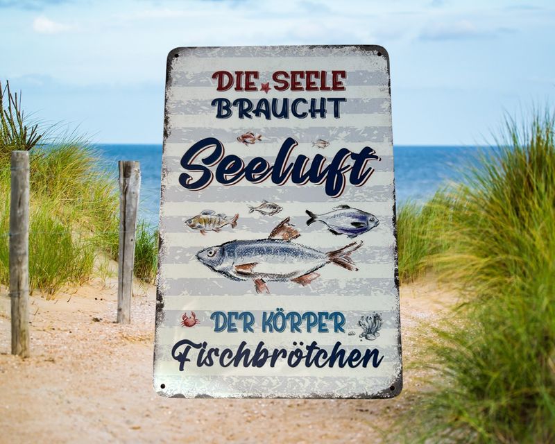 Blechschild „Die Seele braucht Seeluft. Der Körper Fischbrötchen.“