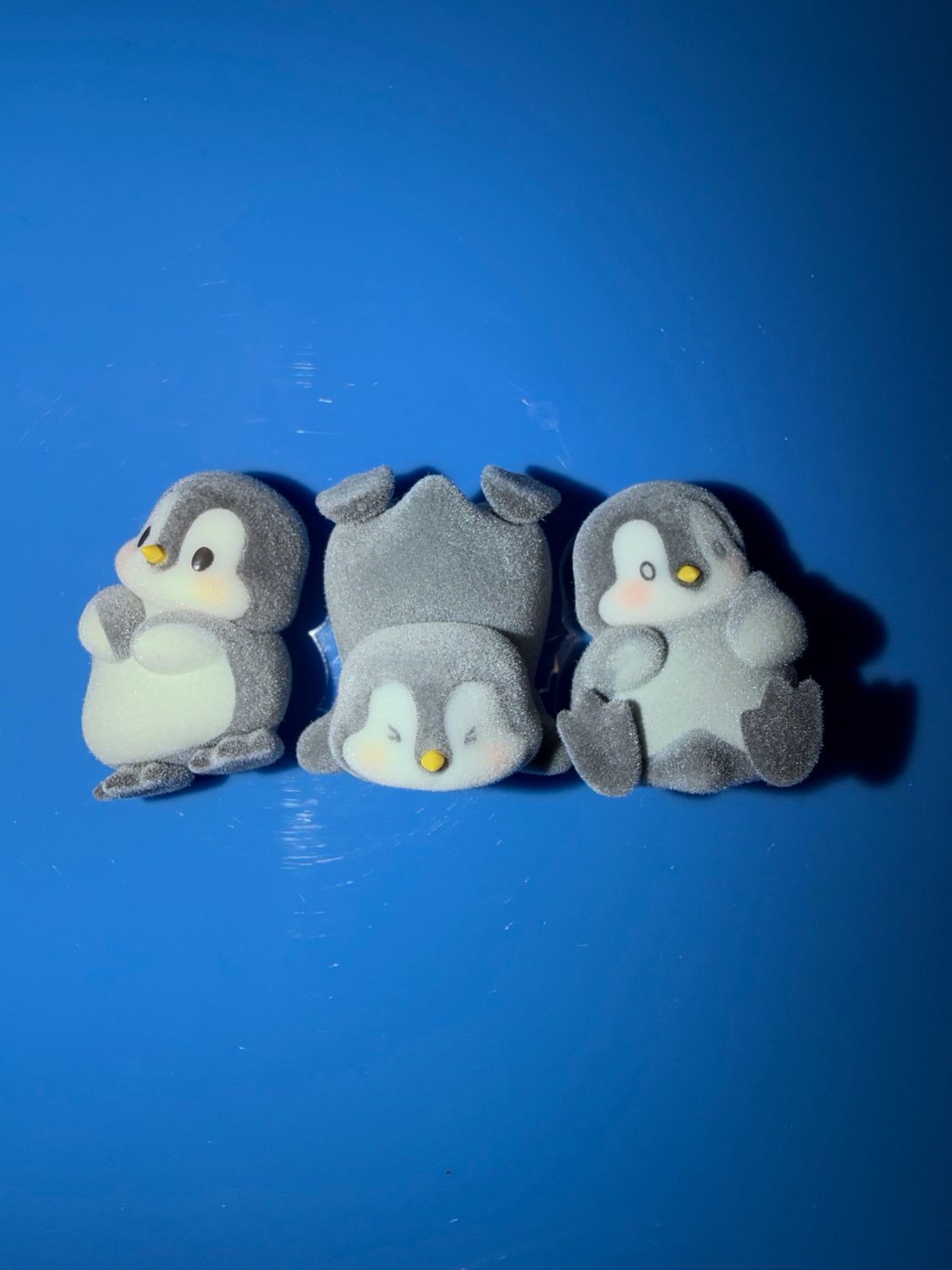 3 FLOCKED PENGUINS