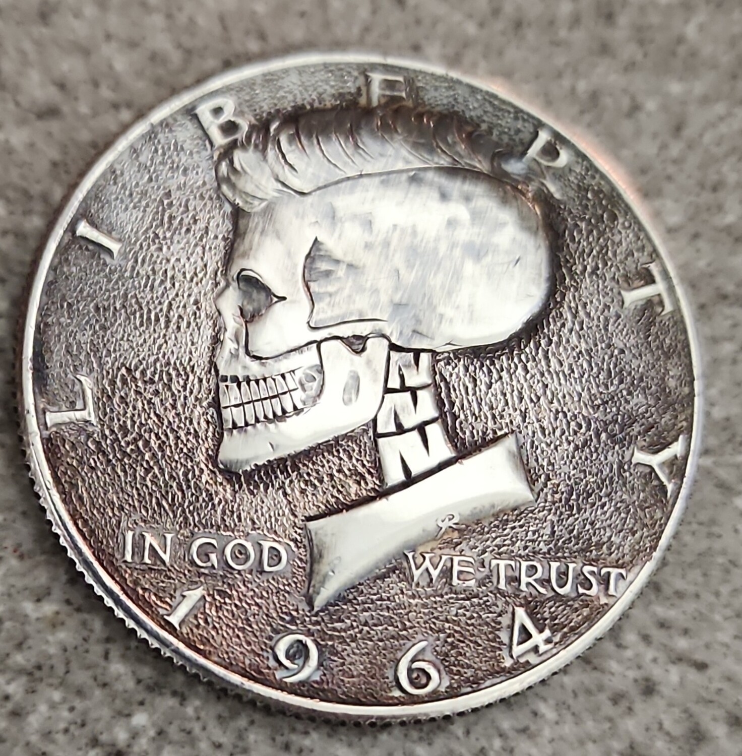 Kenedy half dollar carved coin
