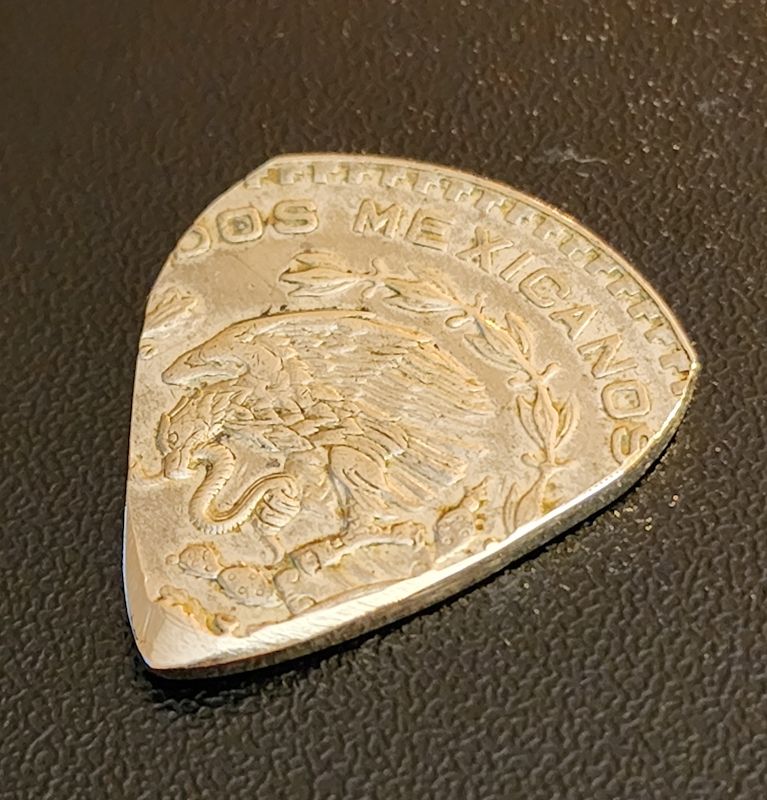 Un Peso Guitar Pick