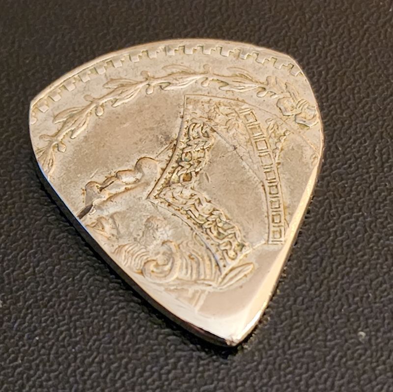 Un Peso Guitar Pick