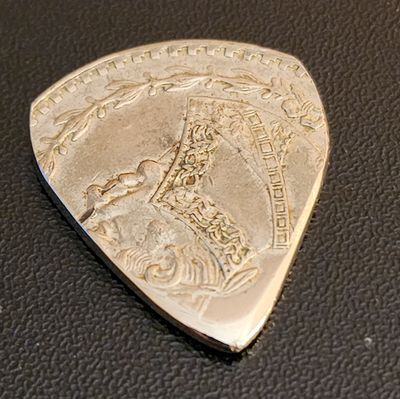 Un Peso Guitar Pick