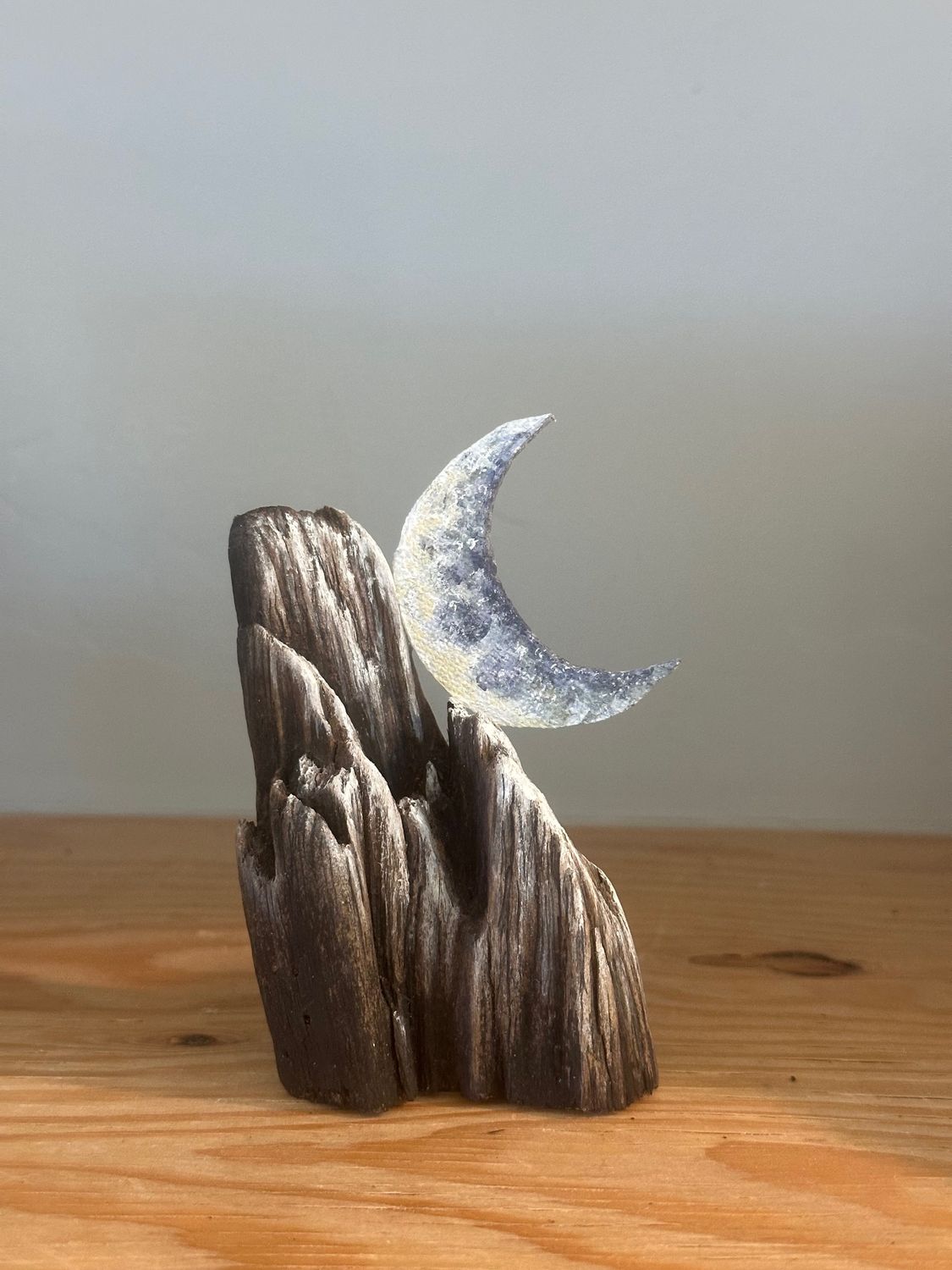 Small standing mountain moon