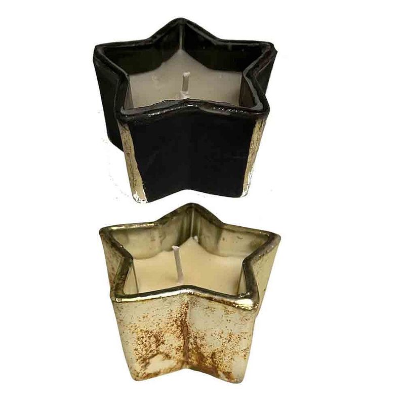 Stervormige glazen kaars van Home Society, verkrijgbaar in zwart of goud.