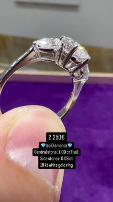 1.00 Oval With Side Pear Shapes