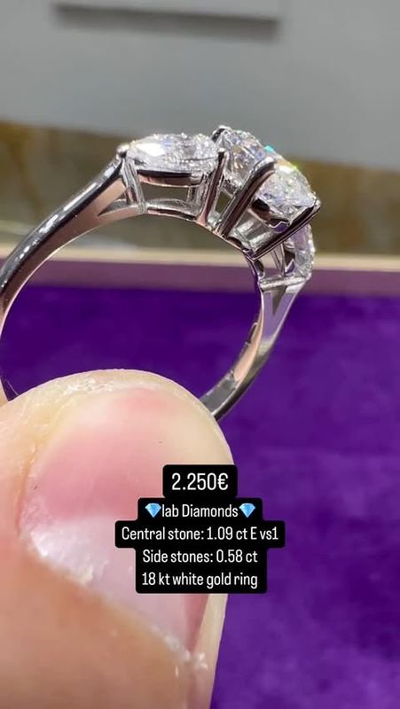1.00 Oval With Side Pear Shapes
