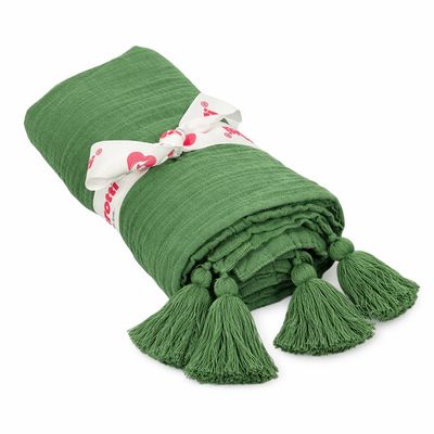 Couverture en mousseline biologique à pompons vert