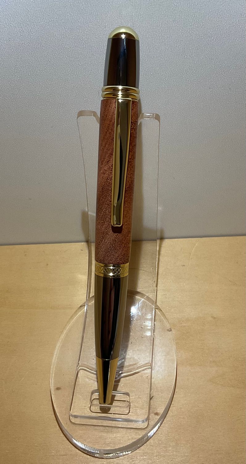 Serra twistpen , houten balpen. Handmade in België, handgedraaid op de houtdraaibank, penkit (Goud met Titanium ) afgewerkt met African Rosewood.