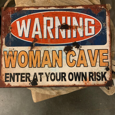 TB Woman Cave Warning